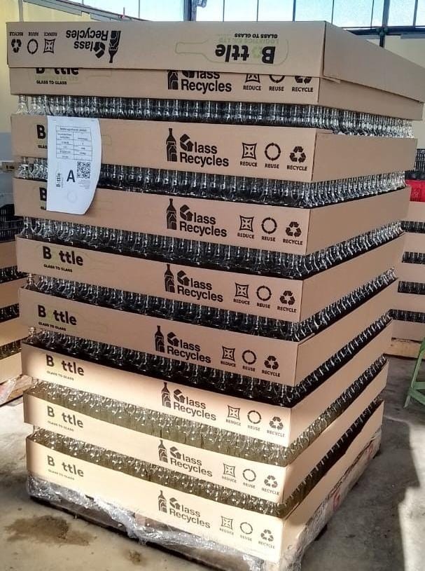 Sparkling clean glass bottles ready for reuse